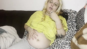 Massage of the swollen belly burping the couch