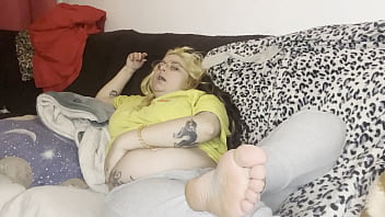 Massage of the swollen belly burping the couch