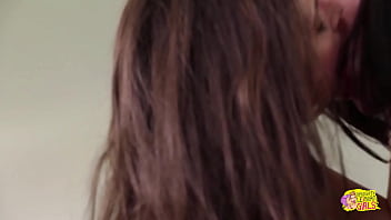 Sexy little lesbians fuck each other on a table