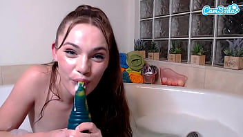 Cute amateur teen fucks herself with a monster dildo and plays with her ass in the bathtub