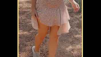 Milf shows her shaved pussy in public