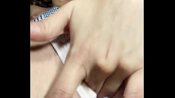 Innocent girl with a tender face masturbates her pussy in a miniskirt