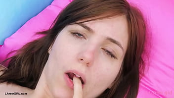 Striking brunette model naked close up