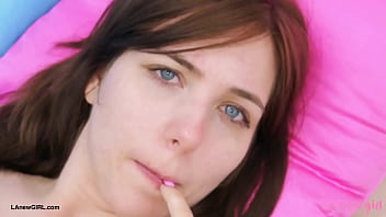 Striking brunette model naked close up