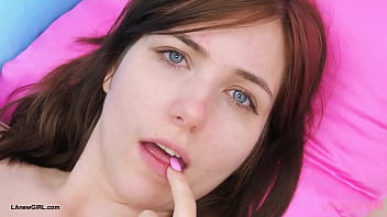 Striking brunette model naked close up