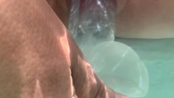 Underwater creampie and dildo in pussy