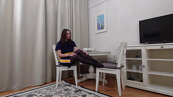 Evelyn trying on black and tan pantyhose tease