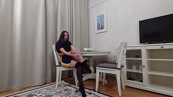 Evelyn trying on black and tan pantyhose tease