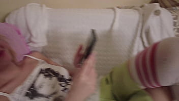 Blonde cutie in stockings fingering her sweet cunt