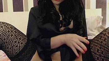 Hot brunette toys her shaved pussy on webcam