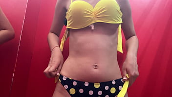 Trying on swimsuits in the fitting room