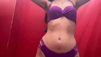 Trying on swimsuits in the fitting room