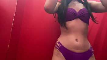 Trying on swimsuits in the fitting room