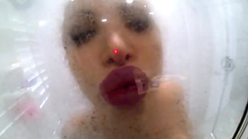 Nikki benz soaps up her tits & masturbates her during shower time