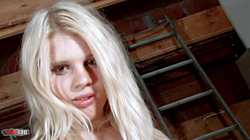 Blond teen is stripping and showing her pink pussy Blond teen is stripping and showing her pink pussy