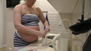 Pregnant neighbor blows me in the kitchen while her hubby works