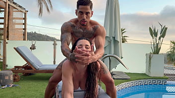 Oiled massage and rough sex in the swimming pool