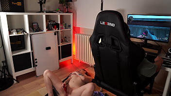 While i play video games she tries to seduce me for sex