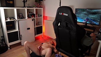 While i play video games she tries to seduce me for sex