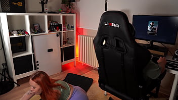 While i play video games she tries to seduce me for sex