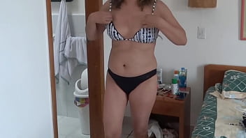 I filmed my beautiful stepmother putting on a bikini to go to the beach big beautiful ass
