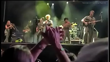 Black girl takes a piss on a man at live concert