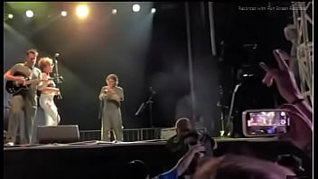 Black girl takes a piss on a man at live concert