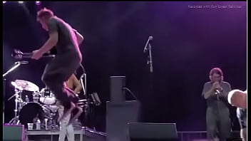 Black girl takes a piss on a man at live concert