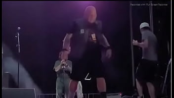 Black girl takes a piss on a man at live concert