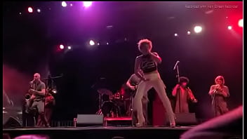 Black girl takes a piss on a man at live concert