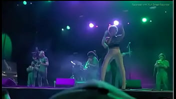 Black girl takes a piss on a man at live concert