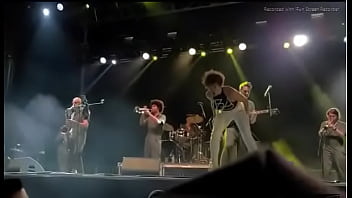 Black girl takes a piss on a man at live concert Black girl takes a piss on a man at live concert