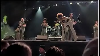 Black girl takes a piss on a man at live concert