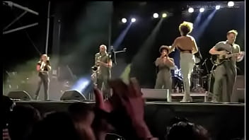 Black girl takes a piss on a man at live concert