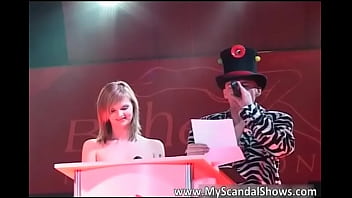 Sexy brunette babe receive award