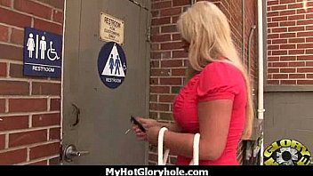 White milf sucking and licking a black cock 3