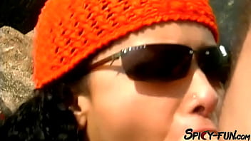 Female tourist receives a facial on the rocks