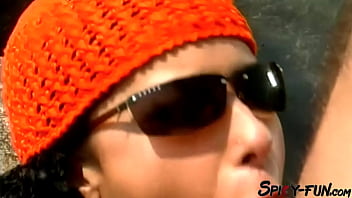 Female tourist receives a facial on the rocks