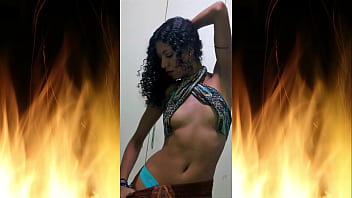 Jade wearing shorts to tease her neighbor who watches her through the window