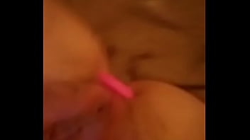 Girl plays with butt plug