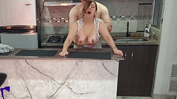 My best friend’s milf wife teases me in the kitchen and we end up fucking hard with vaginal creampie