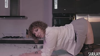In the kitchen milf sara jay works on her pink glass dildo & big tits