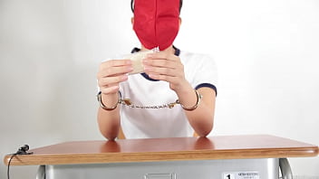 A girl who guesses what she is touching with a blindfold A girl who guesses what she is touching with a blindfold