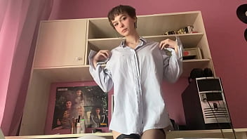 Slim beauty starts touching her bald slit and reaches an orgasm quickly