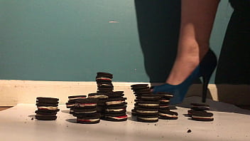 Miss trisha has fun playing with her food in high heels