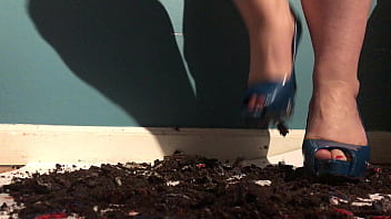 Miss trisha has fun playing with her food in high heels