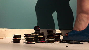 Miss trisha has fun playing with her food in high heels