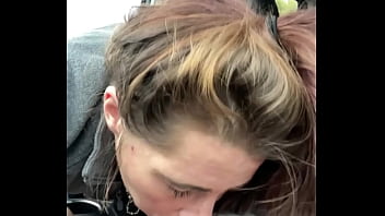 Streetwalker slurps cum off a guy's dick after she deepthroats his cock