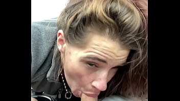 Streetwalker slurps cum off a guy's dick after she deepthroats his cock