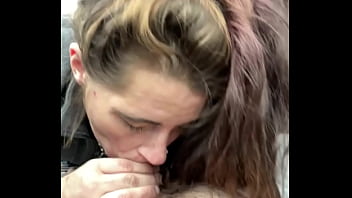 Streetwalker slurps cum off a guy's dick after she deepthroats his cock